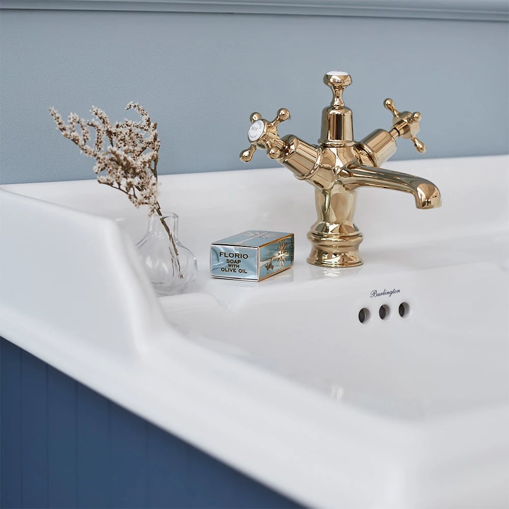 Close up Claremont tap with regent base in gold