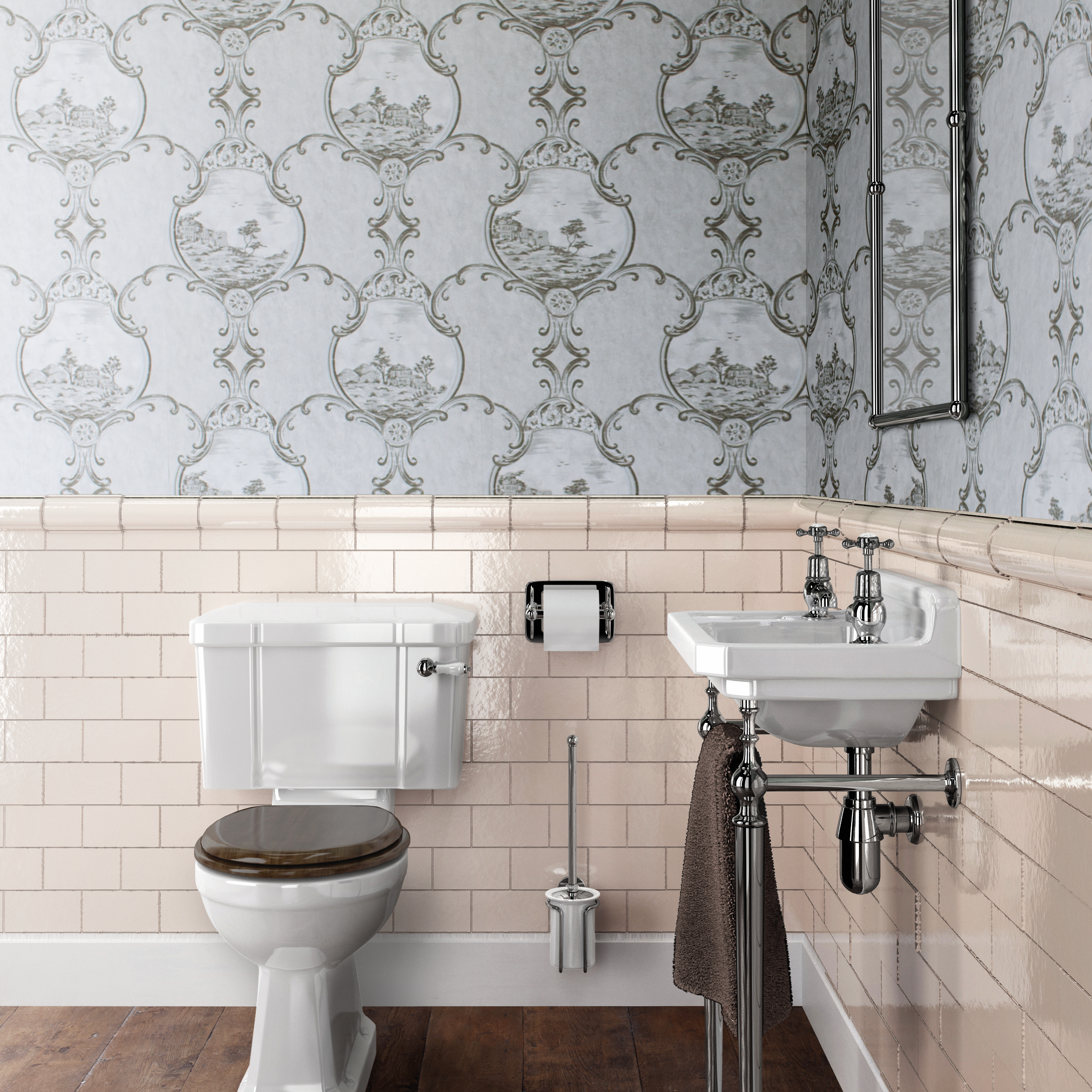 The use of Victorian style wallpaper and neutral, untextured tiles creates a stunning, traditional cloakroom design. Edwardian Cloakroom Basin and Regal Close Coupled WC in a traditional white