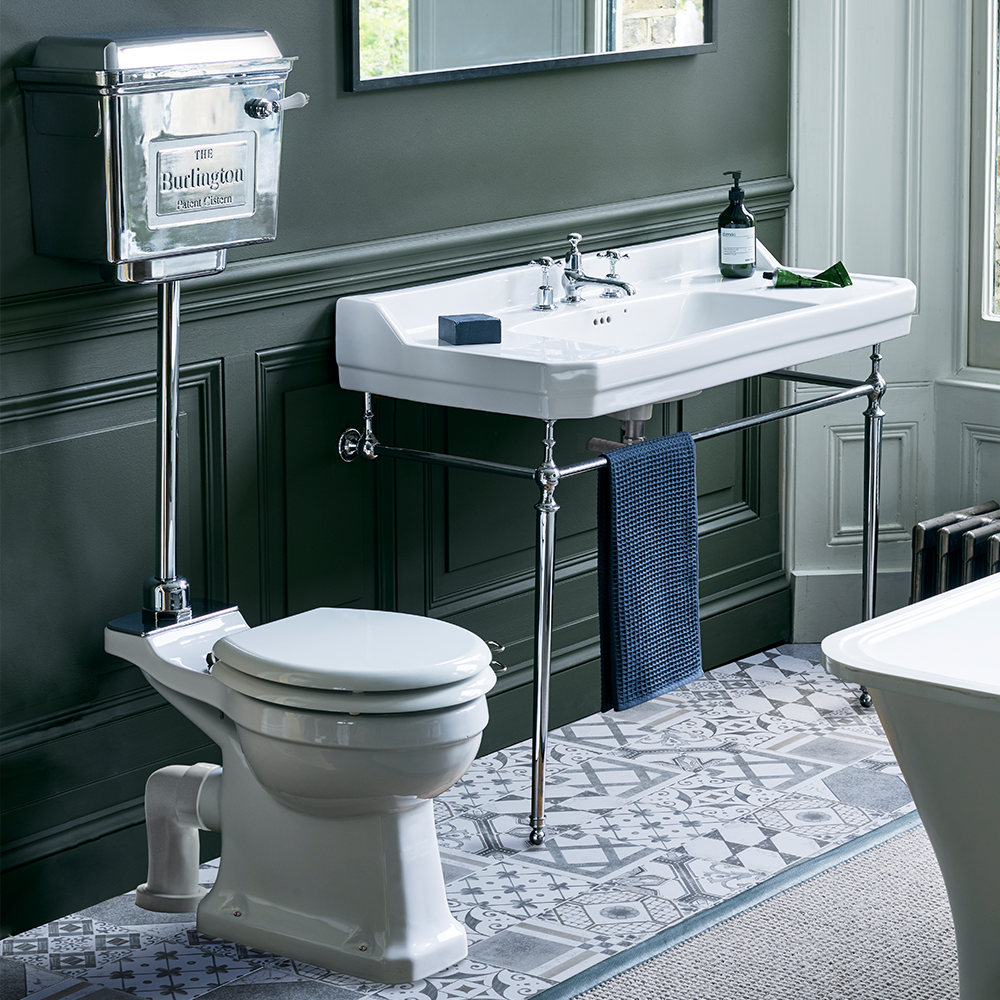 Inspire a traditional bathroom design with a difference with this modern classic bathroom idea. Pair Chrome elements with periodic style products for an altogether authentic bathroom design Traditional Bathroom Design | Create a striking modern classic bathroom design by pairing traditional products with contemporary decor